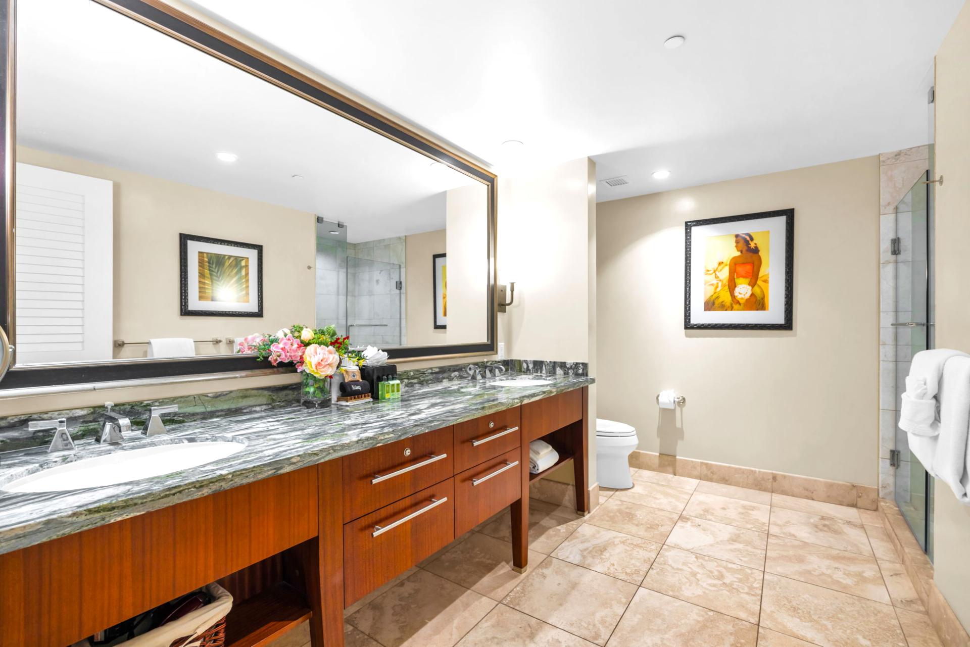 Refresh in your ensuite with a spacious layout, oversized mirror, and elegant tilework throughout. HKH-203