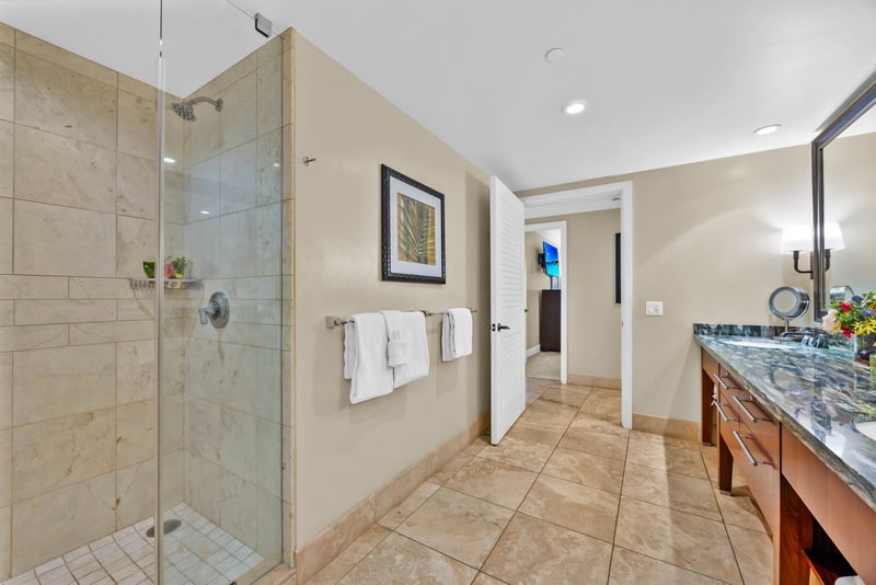 Step into your glass walk-in shower or soak in the deep tub after a full day of island adventure.