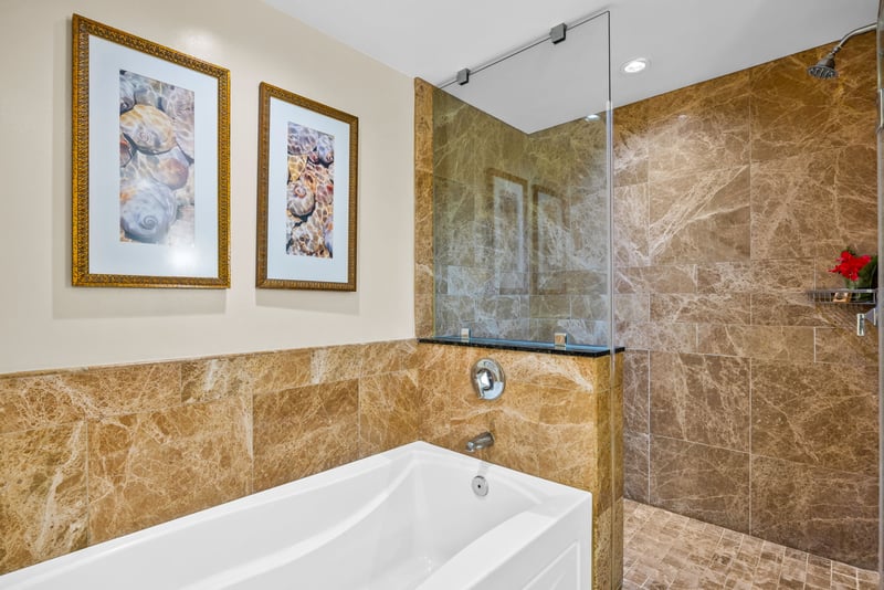 A deep soaking tub and full vanity provide everything your guests need for a comfortable refresh.