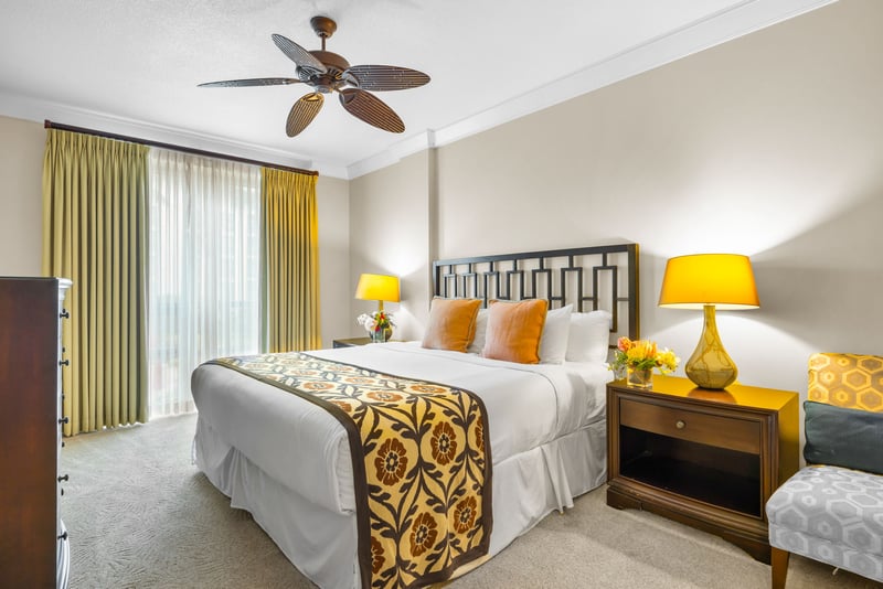 Guest bedroom one includes a cozy King bed and soft lighting for relaxed mornings and quiet evenings.