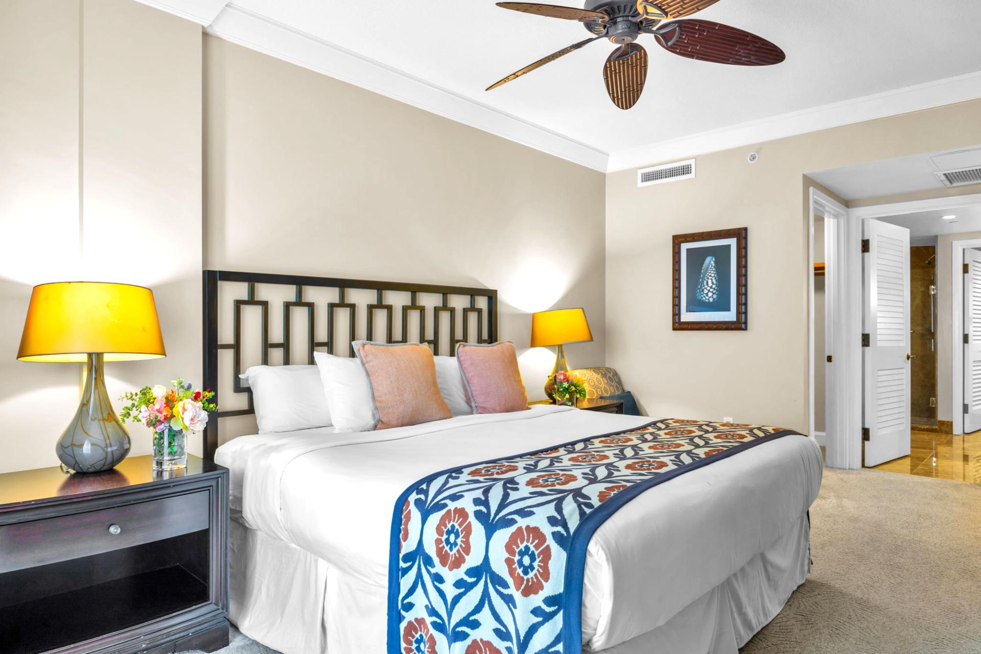 Your guests will love this private bedroom with colorful accents, ceiling fan, and ample space to unpack. HKH-203
