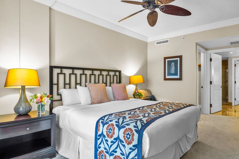 Your guests will love this private bedroom with colorful accents, ceiling fan, and ample space to unpack.
