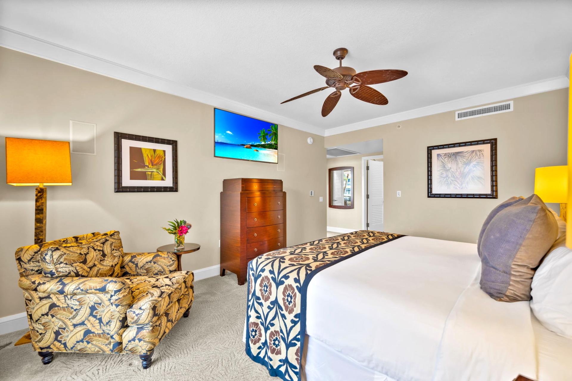 Light-filled second bedroom with adjustable split King bed and a ceiling fan for comfort. HKH-203