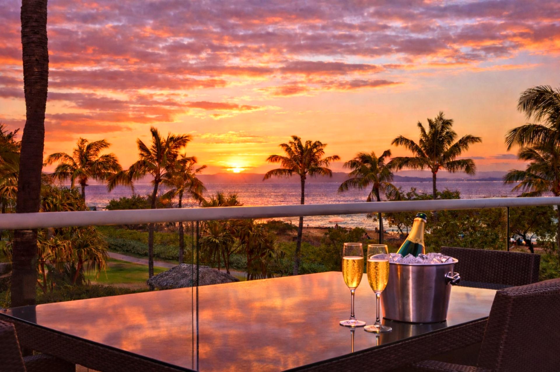 A wide-open private balcony made for happy hour sunset gazing.