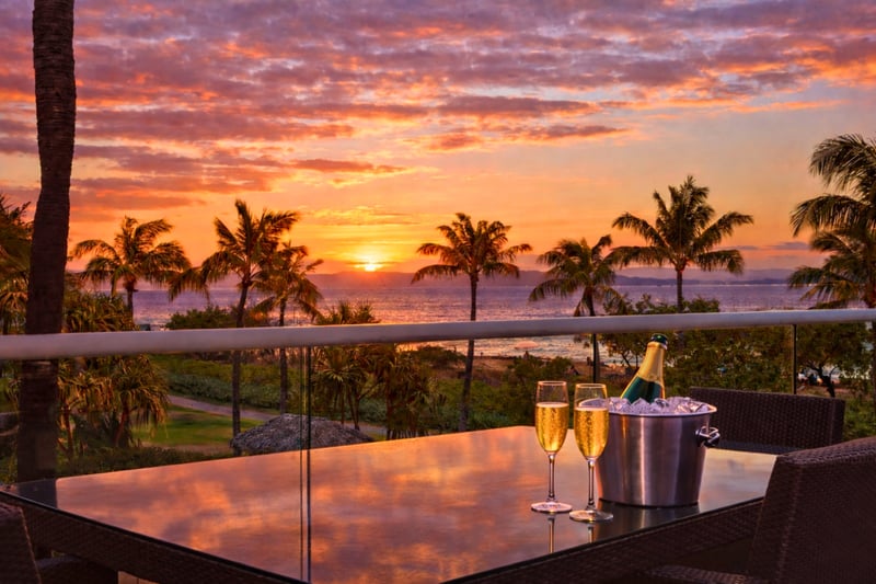 A wide-open private balcony made for happy hour sunset gazing. HKH-204