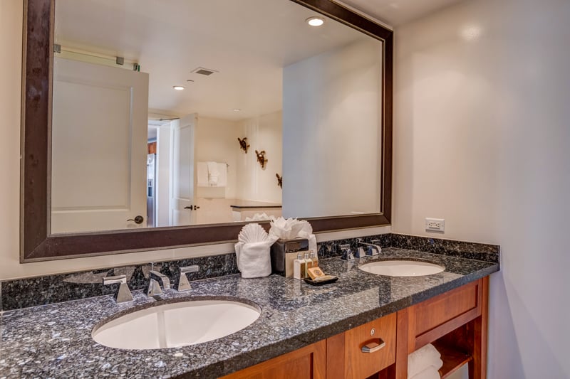 Step into luxury with granite counters and walk-in shower bliss