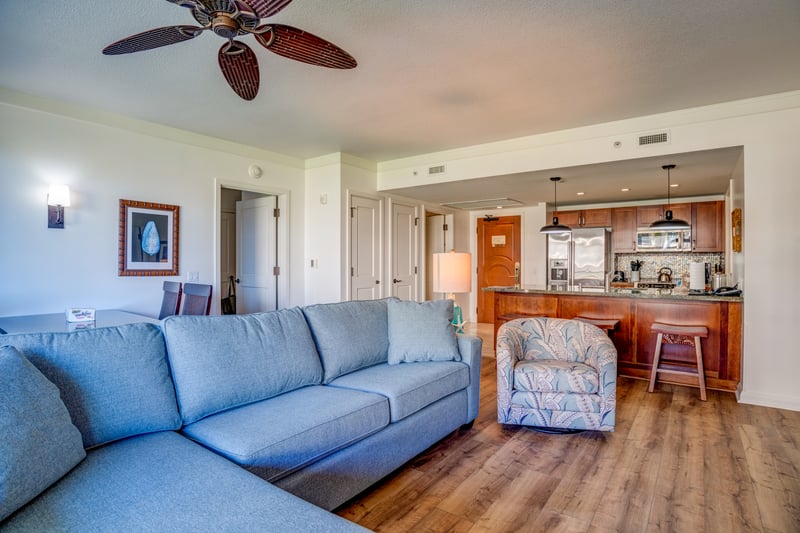 Chic yet cozy—this stylishly furnished living room with coastal accents offers the ultimate retreat for your Hawaiian escape HKH-211