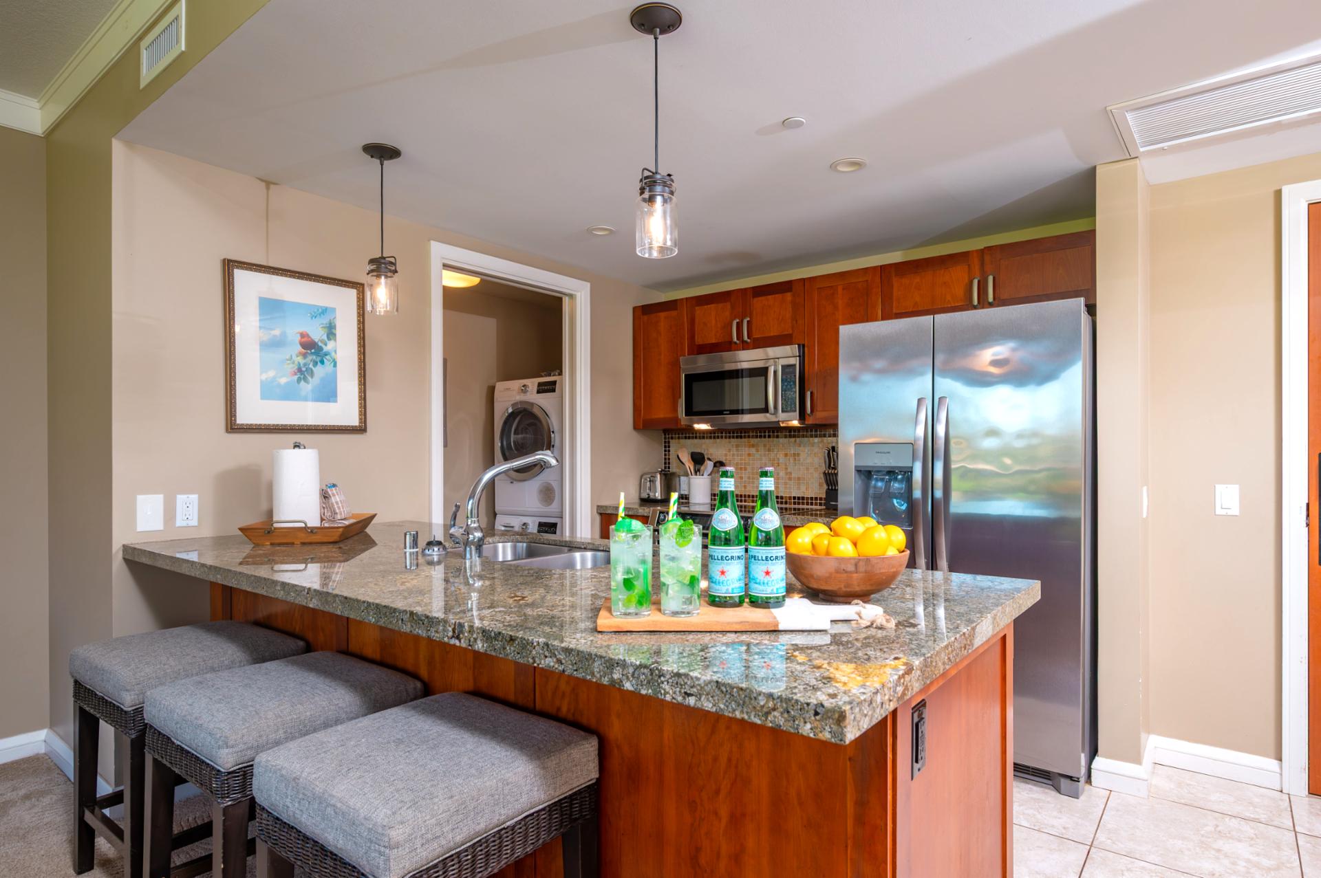 Modern kitchen with granite counters, stainless appliances, and everything needed for home-cooked meals.