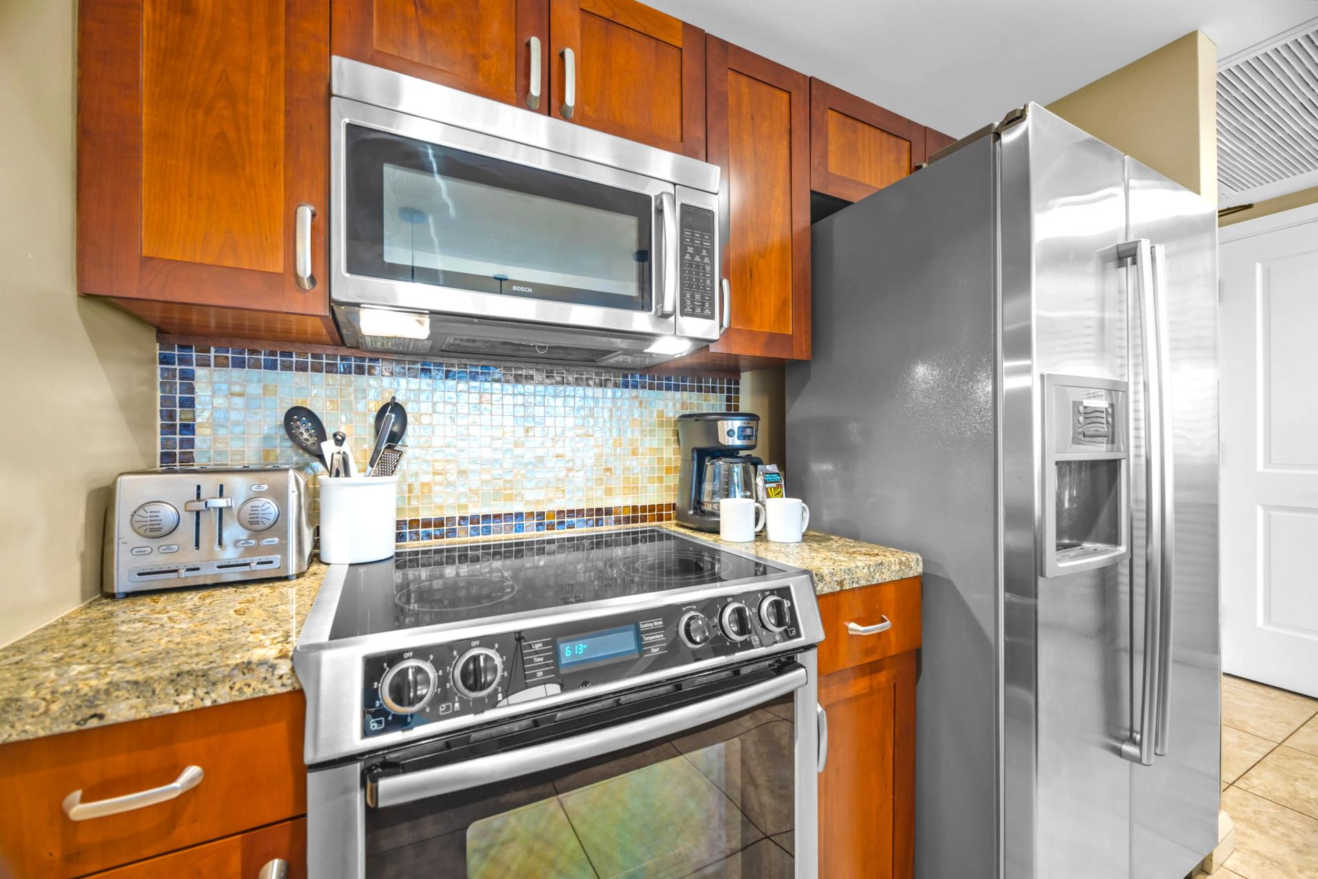 Blend island flavors in your well-stocked kitchen with stainless appliances and convenient breakfast bar seating.