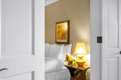 Enjoy privacy and comfort in the guest room, perfect for kids or friends with its soft tones and Queen bed.