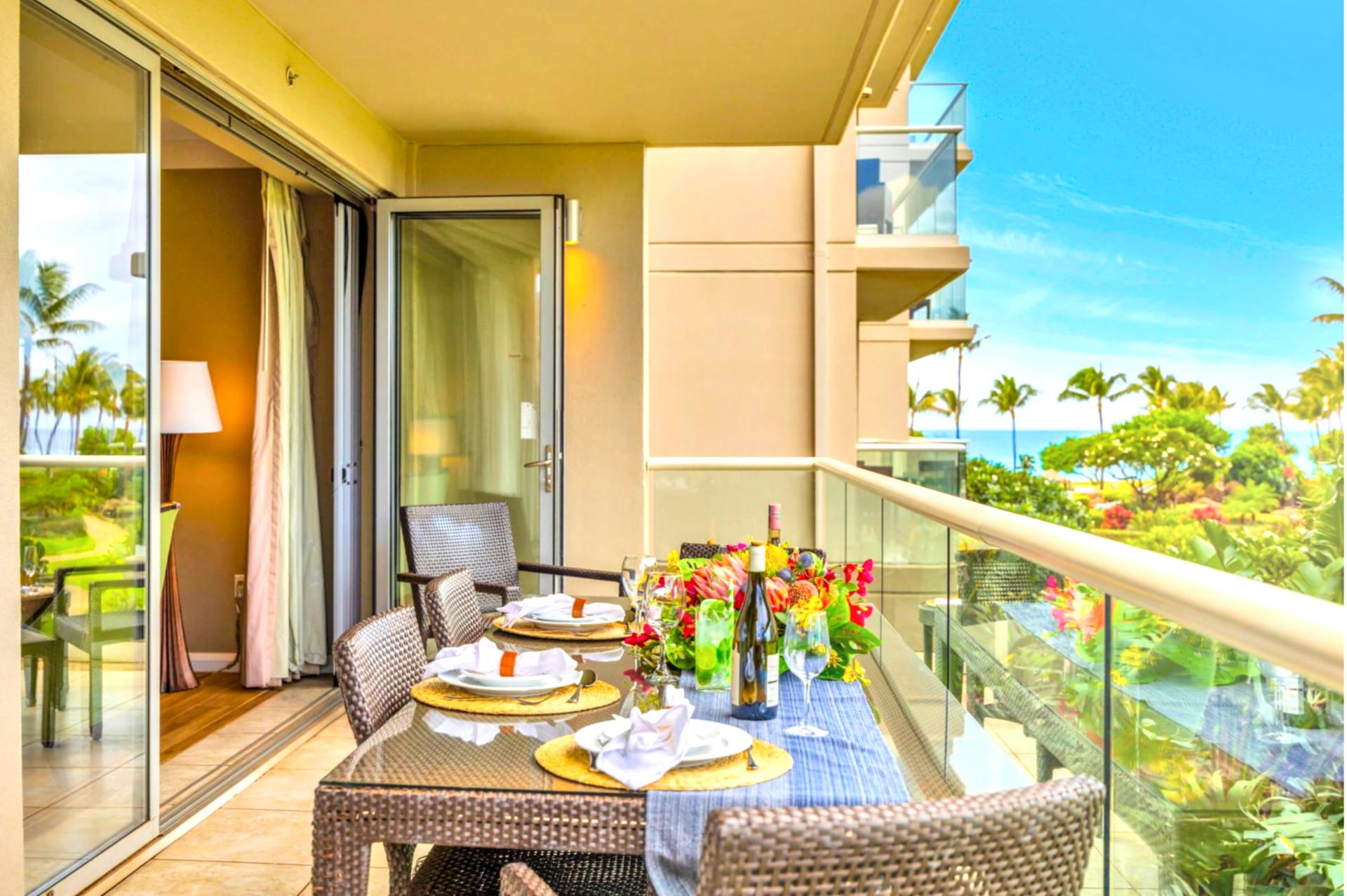 Take in lush garden and partial ocean views from your spacious lanai with a table for four, perfect for sunset dinners or a breezy morning coffee.