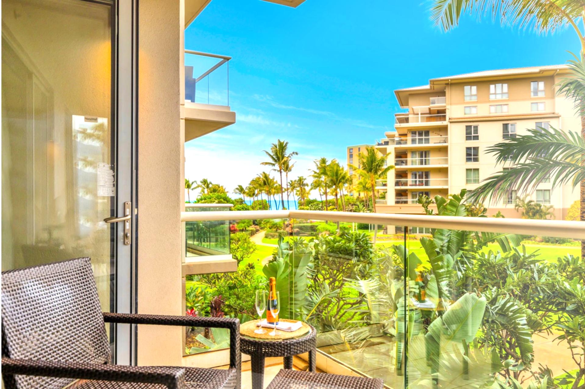 Slide open the glass doors to connect your living space to the generous lanai, offering indoor-outdoor flow and natural light.