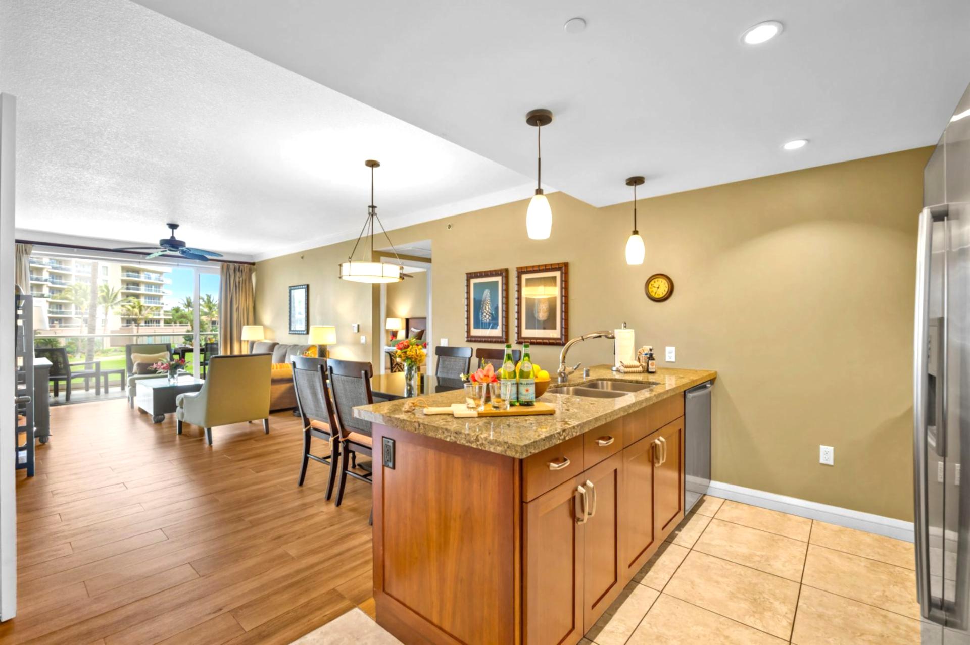 Granite counters, full-size appliances, and ample cabinet space make this kitchen ready for everything from snacks to full dinners.
