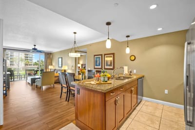 Granite counters, full-size appliances, and ample cabinet space make this kitchen ready for everything from snacks to full dinners.