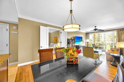 The kitchen's open design lets you prep meals while staying connected with the dining and living areas.