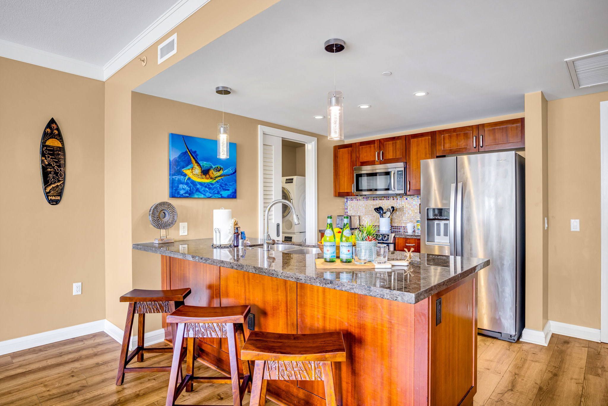 Dining area adjacent to the kitchen offers seating for six and easy mealtime flow. HKH-305