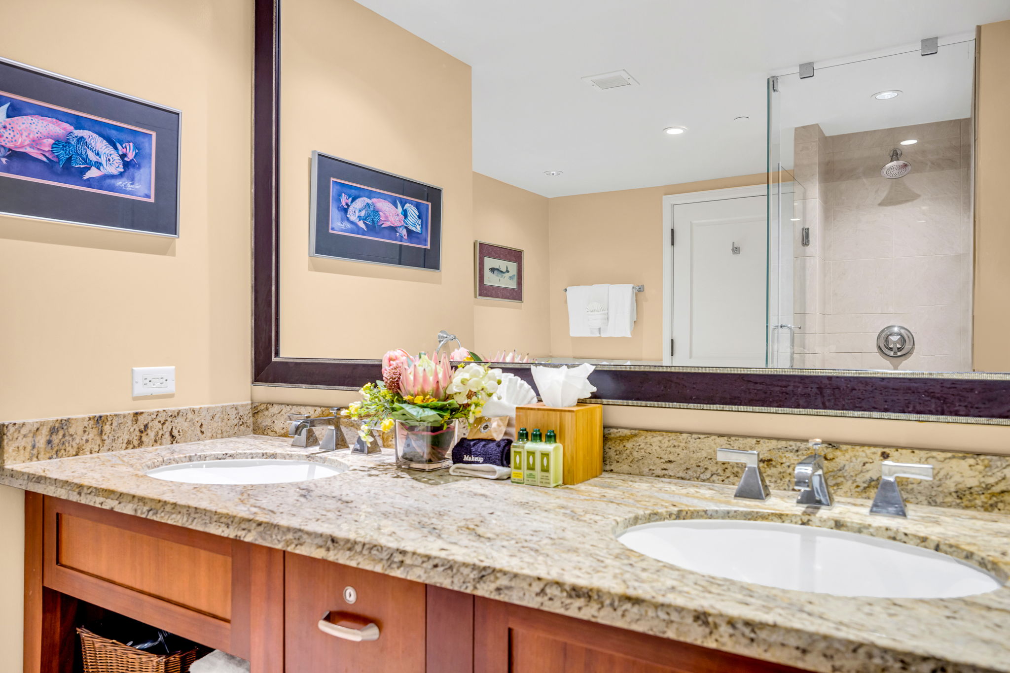 Double vanity with granite counters and plenty of space to unpack in the spa-style ensuite. HKH-305