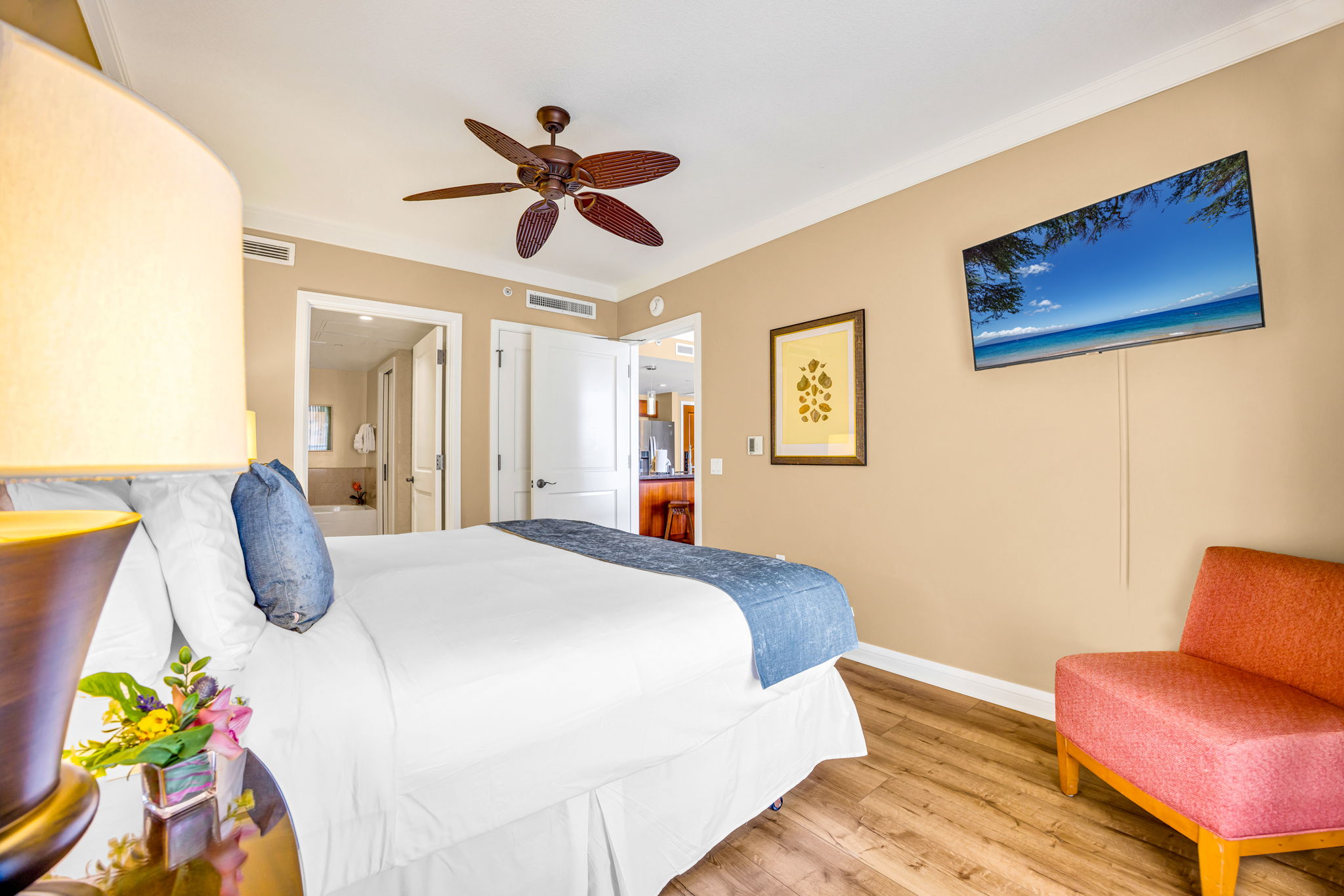 Guest bedroom with King bed and tropical touches, just steps from the guest bath. HKH-305