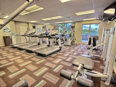 On-site fitness center with cardio machines, strength training, and scenic views to keep you inspired