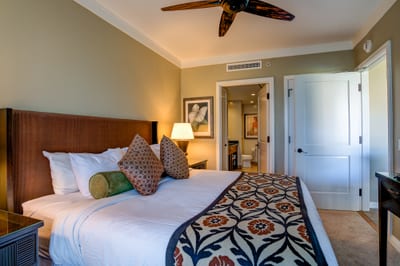 Large master suite complete with ceiling fans and large storage space HKH-338