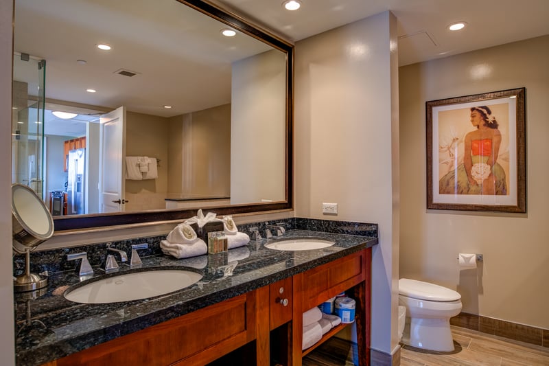 Custom counter tops with ample storage and deco lighting   