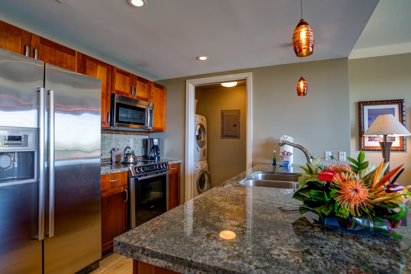 Custom kitchen - complete with washer and dryer in unit ready for your use   