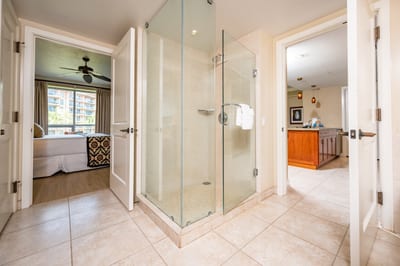 Crisp lines and warm tones make this bath a perfect private escape
