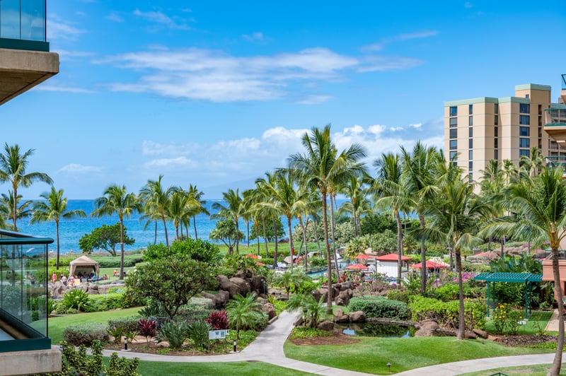 Ocean whispers through tropical greens