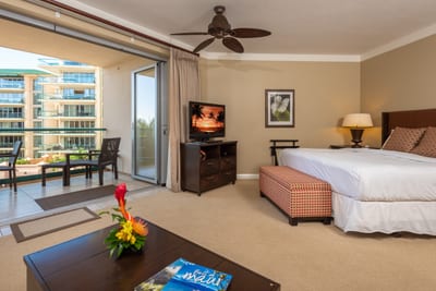 Enjoy indoor-outdoor living in this elegant bedroom suite with direct lanai access and inviting island décor HKH-423