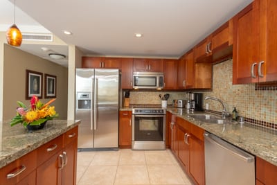 Prepare meals with ease in this elegant kitchen featuring granite counters, stainless appliances, and charm HKH-423
