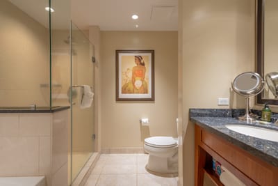 Unwind in a sophisticated bathroom with both tub and shower surrounded by calming neutral tones HKH-423