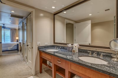 Granite countertops and wood finishes offer timeless island charm