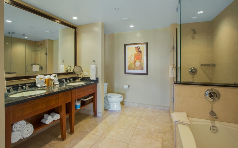 Granite countertops and wood finishes offer timeless island charm