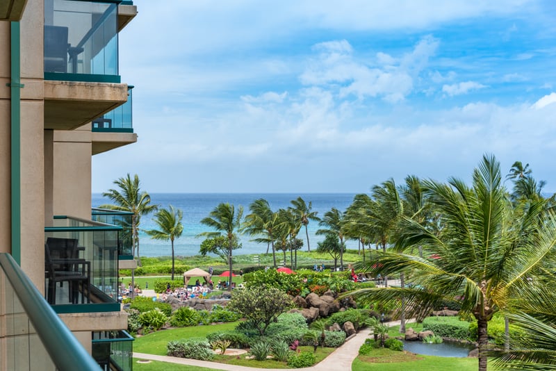 Wake up to breathtaking views of the Pacific Ocean and lush resort gardens from your private lanai in Kaanapali, Maui