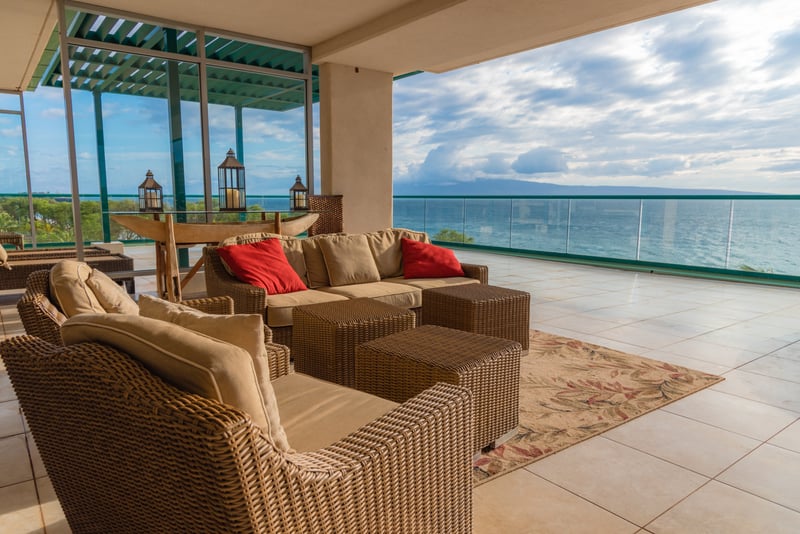 Endless ocean, swaying palms, and sky-high comfort—this lanai is your personal slice of paradise