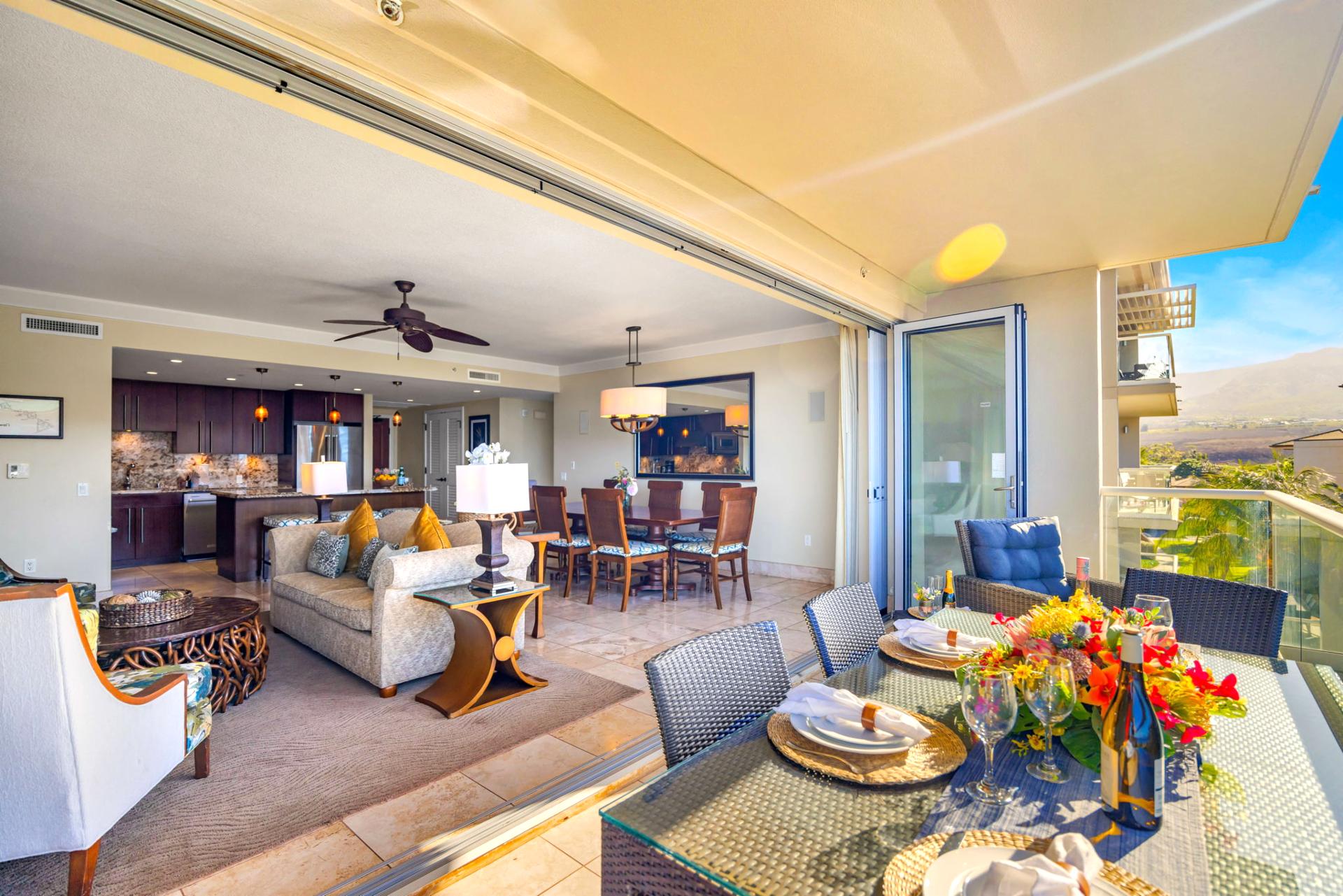 Dining table for six connects seamlessly with the view and living space for shared meals and conversation.