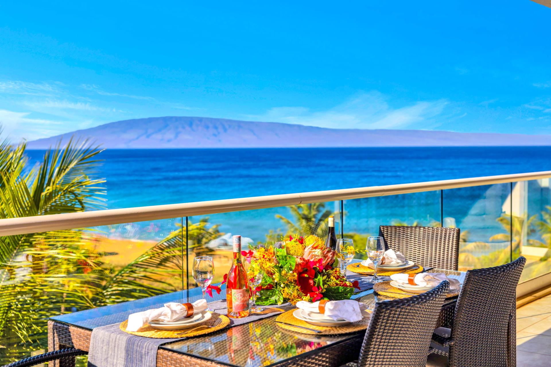 Dine under the Maui sky with views of the ocean and island landscape from the private lanai.