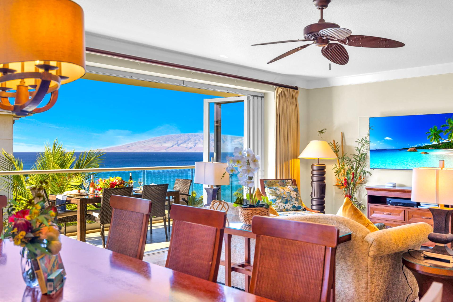Thoughtfully placed dining area keeps everyone connected between kitchen, living, and lanai.