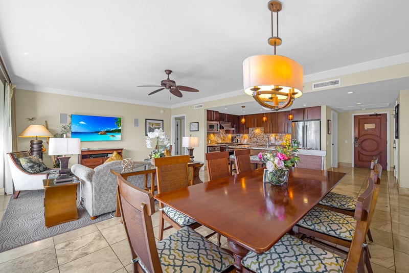 Dining table set within the main living area, ideal for family meals and game nights.