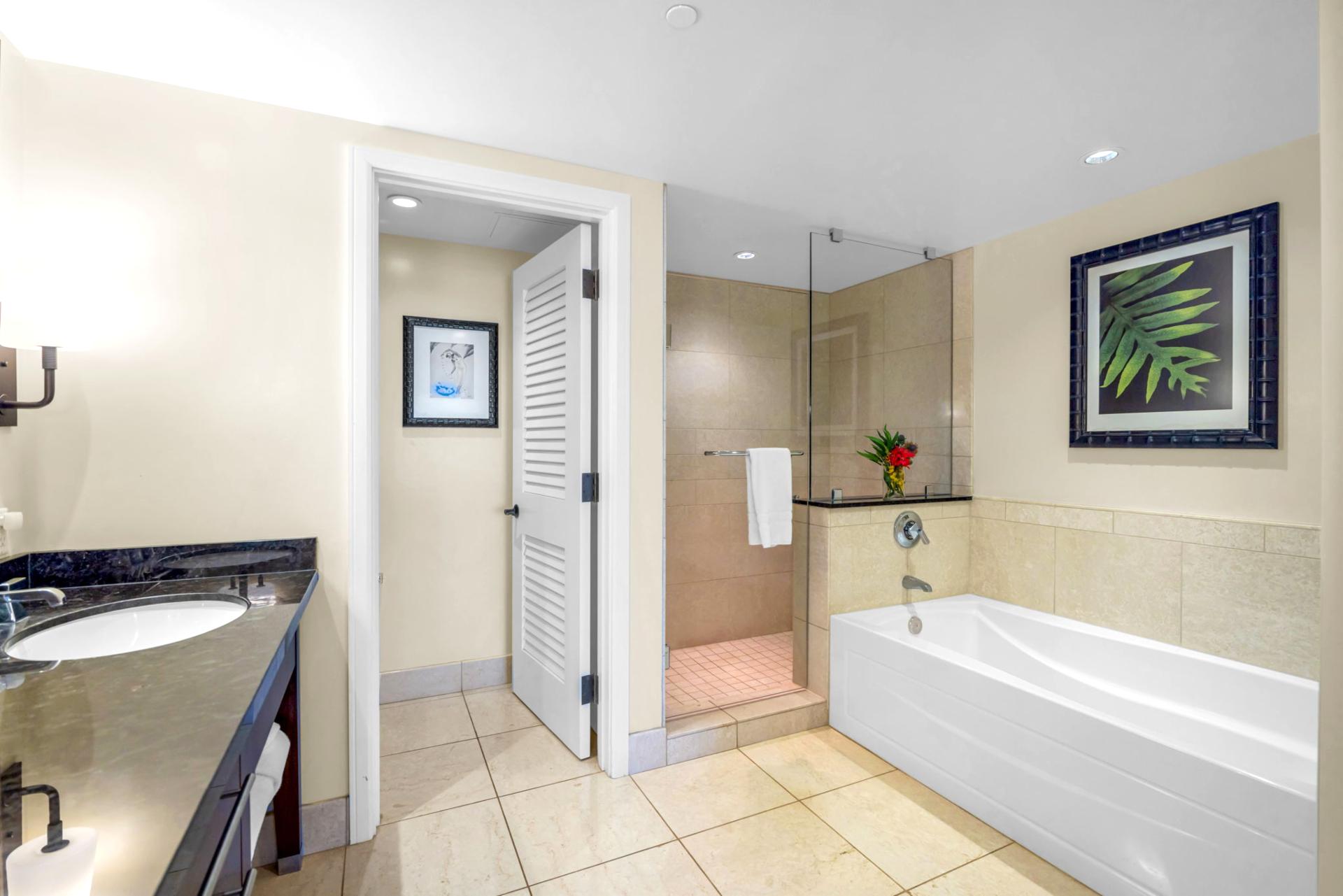 Additional view of the guest bath showing layout details, including private toilet area.