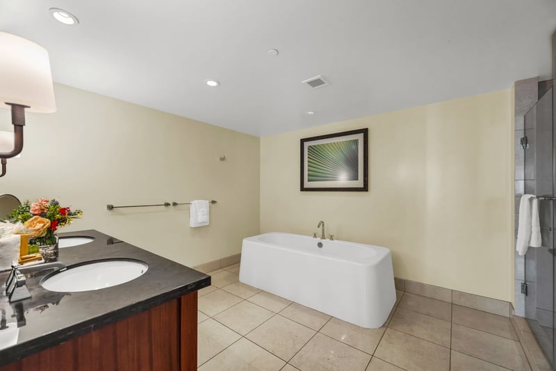Additional view of guest bath showing layout and direct bedroom access.