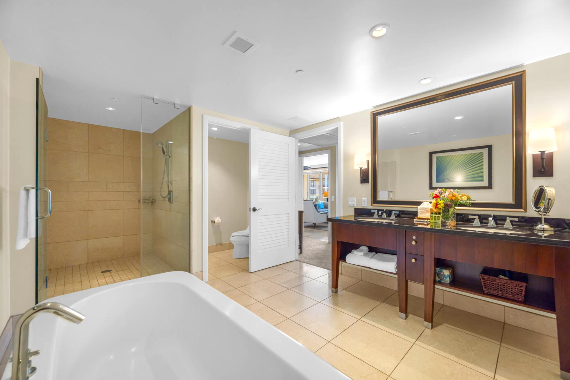 Guest bathroom with granite counters and spacious layout for shared comfort.