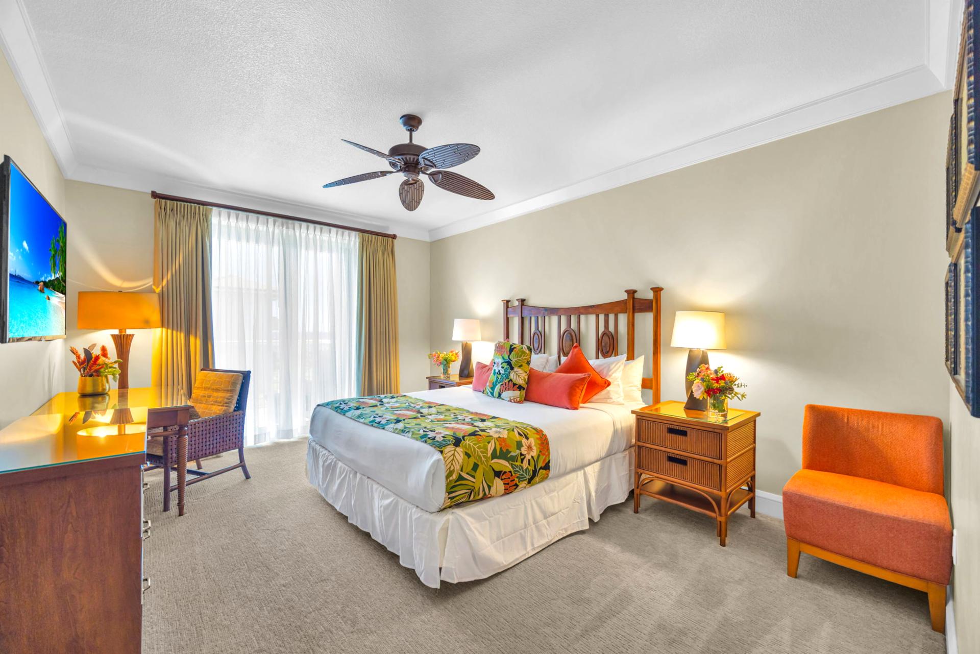 Primary bedroom features a King bed and soft, neutral decor for restful nights.