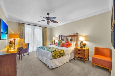 Primary bedroom features a King bed and soft, neutral decor for restful nights. HKH-504