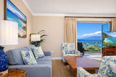 Sliding doors connect your living space to the wraparound lanai, letting you enjoy ocean views and tropical breezes while relaxing on the comfortable sectional. HKH-515