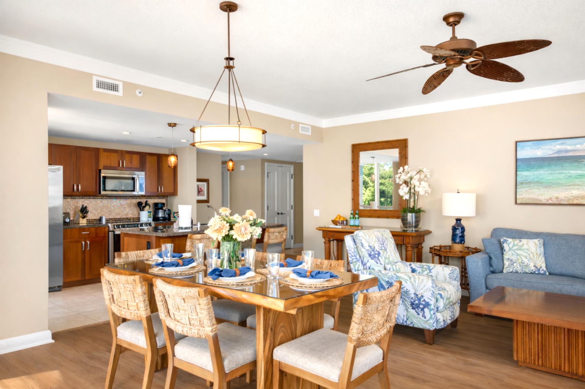 Warm wood cabinetry and generous counters frame your kitchen and dining area, making it easy to prepare meals while staying connected with everyone nearby.