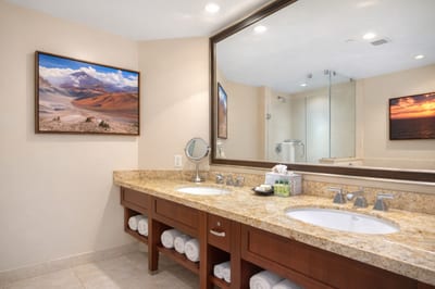 A granite double vanity offers generous counter space in your Primary Bathroom, making it easy to get ready for dinner or island adventures. HKH-515