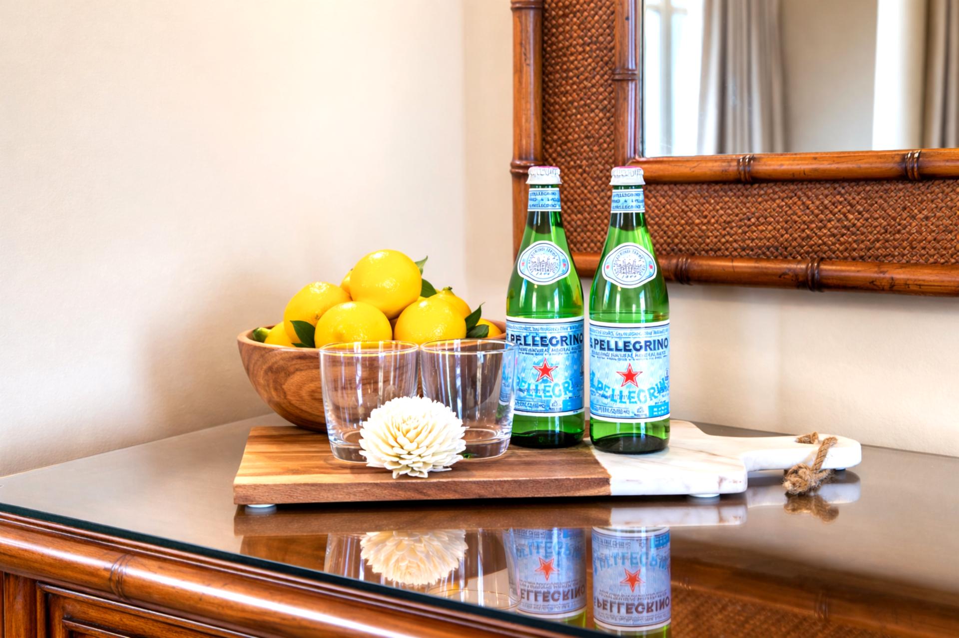 Granite countertops and polished finishes add a refined touch to your kitchen workspace, where preparing snacks or cocktails feels effortless.
