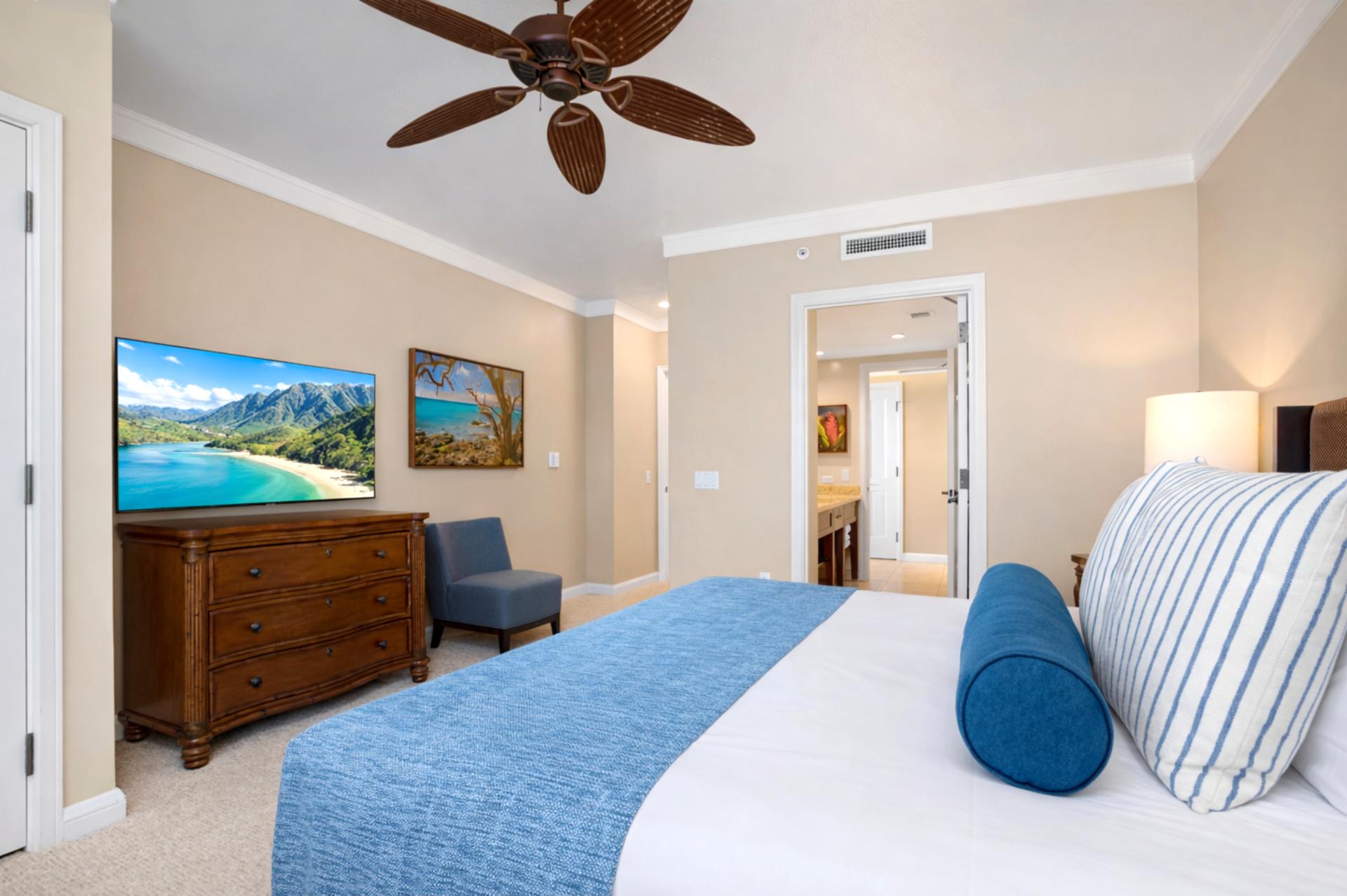 The second bedroom offers a versatile King or two Twin configuration, along with warm wood furnishings and thoughtful details for a restful stay.