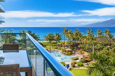 From your private lanai at Honua Kai HKH-515, you look out over swaying palms, resort pools, and the deep blue Pacific stretching along the Maui coastline. HKH-515